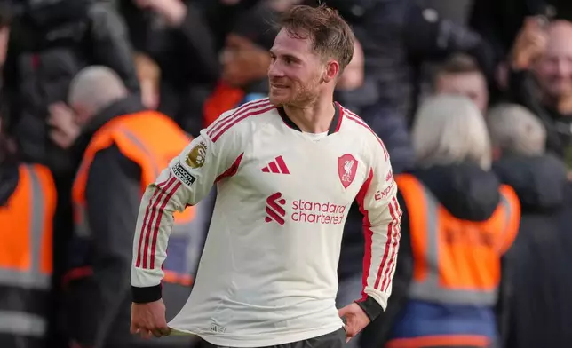 Liverpool's Alexis Mac Allister celebrates scoring his side's first goal during the English Premier League soccer match between Nottingham Forest and Liverpool in Nottingham, Sunday, Feb. 22, 2026.(AP Photo/Dave Shopland)