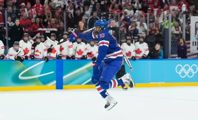 United States' Laila Edwards (10) celebrates as United States' Hilary Knight (21) scored an equalizer during a women's ice hockey gold medal game between the United States and Canada at the 2026 Winter Olympics, in Milan, Italy, Thursday, Feb. 19, 2026. (AP Photo/Petr David Josek)