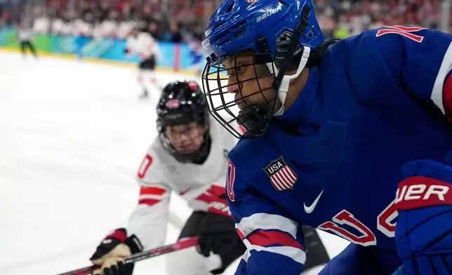 United States' Laila Edwards (10) is in action during a women's ice hockey gold medal game between the United States and Canada at the 2026 Winter Olympics, in Milan, Italy, Thursday, Feb. 19, 2026. (AP Photo/Hassan Ammar)