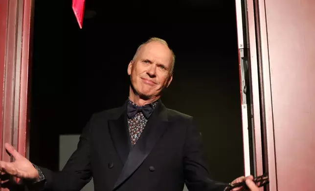 Actor Michael Keaton arrives at Harvard University's Farkas Hall for the school's annual Hasty Pudding Theatricals Man of the Year award show, Friday, Feb. 6, 2026 in Cambridge, Mass. (AP Photo/Leah Willingham)