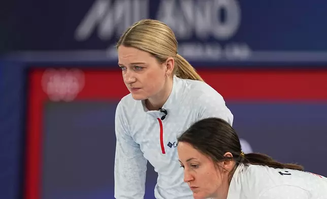 United States' Cory Thiesse, left, and Tabitha Peterson compete during a women's curling bronze medal match between Canada and the United States, at the 2026 Winter Olympics, in Cortina d'Ampezzo, Italy, Saturday, Feb. 21, 2026. (AP Photo/Fatima Shbair)