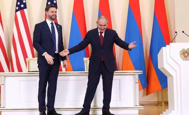 U.S. Vice President JD Vance and Armenia's Prime Minister Nikol Pashinyan hold a joint press conference, in Yerevan, Armenia, Monday, Feb. 9, 2026. (Kevin Lamarque/Pool Photo via AP)