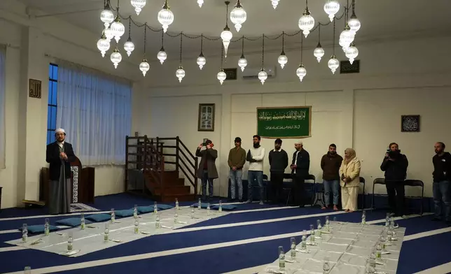 Imam Yahya Pallavicini, vice president of the Italian Islamic Religious Community, speaks at the Al-Wahid mosque during Ramadan in Milan, Italy, Friday, Feb. 20, 2026, as the city hosts the Winter Olympics. (AP Photo/María Teresa Hernández)