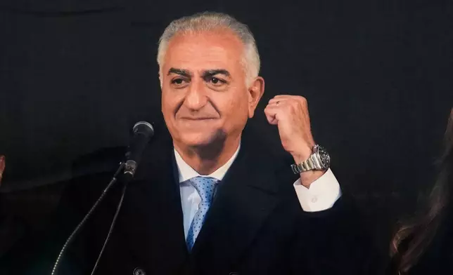 Iran's exiled Crown Prince Reza Pahlavi, speaks to supporters at a demonstration during the Munich Security Conference in Munich, Germany, Saturday, Feb. 14, 2026. (AP Photo/Ebrahim Noroozi)