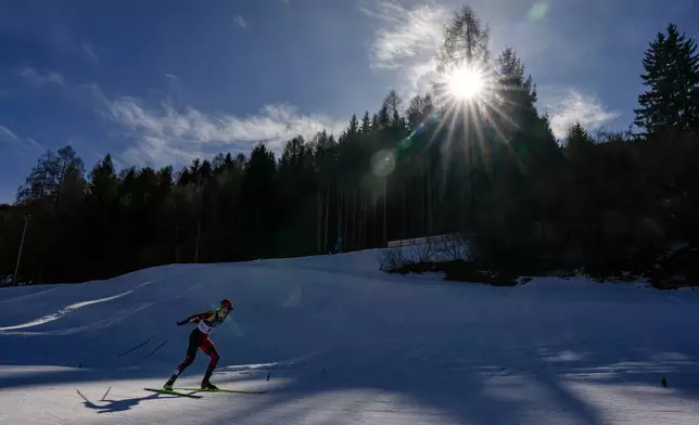 Remi Drolet, of Canada, competes in the cross country skiing men's 10km interval start free at the 2026 Winter Olympics, in Tesero, Italy, Thursday, Feb. 12, 2026. (AP Photo/Matthias Schrader)