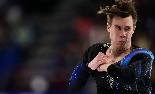 Vladimir Samoilov of Poland competes during the men's free skate program in figure skating at the 2026 Winter Olympics, in Milan, Italy, Friday, Feb. 13, 2026. (AP Photo/Natacha Pisarenko)