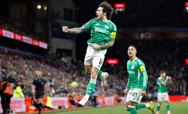 Newcastle United's Sandro Tonali celebrates scoring their side's second goal of the game against Aston Villa during the English FA Cup fourth round soccer match, Saturday, Feb. 14, 2026, in Birmingham, England. (Nigel French/PA via AP)