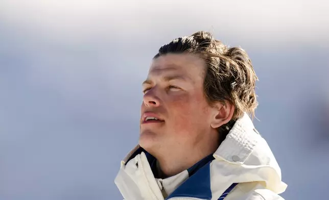 Johannes Hoesflot Klaebo, of Norway, stands on the podium after winning the gold medal in the cross country skiing men's 10km interval start free at the 2026 Winter Olympics, in Tesero, Italy, Friday, Feb. 13, 2026. (AP Photo/Evgeniy Maloletka)