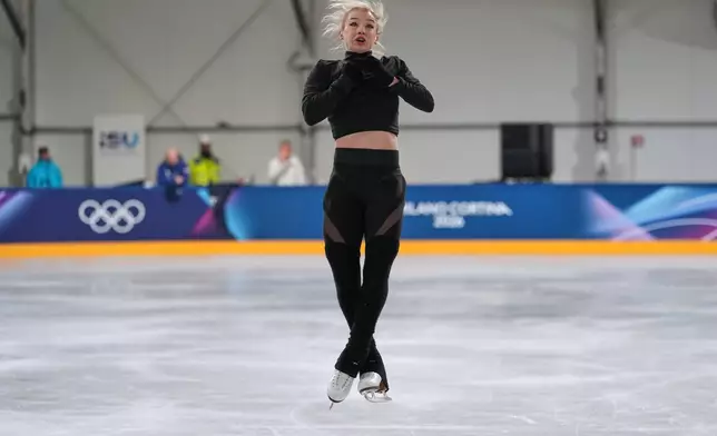 Amber Glenn, of the U.S., performs during a figure skating training session at the 2026 Winter Olympics, in Milan, Italy, Thursday, Feb. 5, 2026. (AP Photo/Francisco Seco)