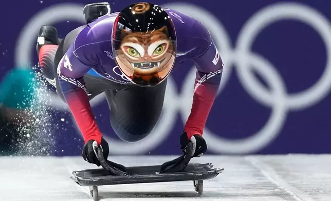 South Korea's Hong Sujung starts for a women's skeleton training session at the 2026 Winter Olympics, in Cortina d'Ampezzo, Italy, Wednesday, Feb. 11, 2026. (AP Photo/Aijaz Rahi)