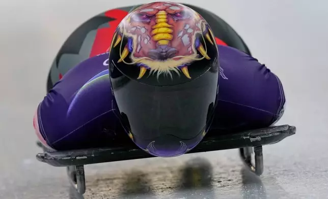 Canada's Jane Channell starts for a women's skeleton training session at the 2026 Winter Olympics, in Cortina d'Ampezzo, Italy, Tuesday, Feb. 10, 2026. (AP Photo/Aijaz Rahi)