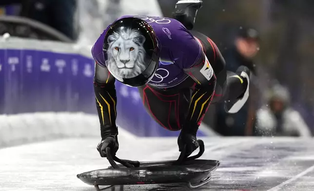 Belguim's Kim Meylemans starts for a women's skeleton training session at the 2026 Winter Olympics, in Cortina d'Ampezzo, Italy, Monday, Feb. 9, 2026. (AP Photo/Alessandra Tarantino)