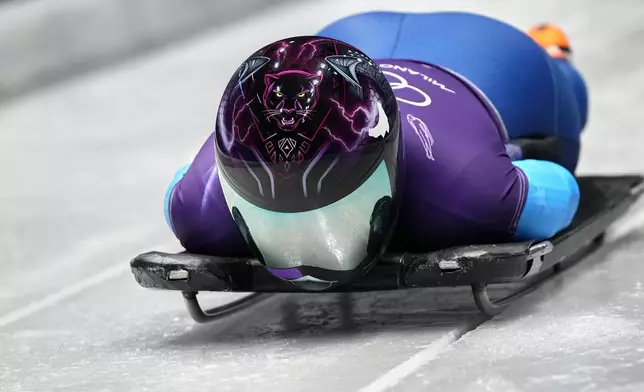 United States' Mystique Ro starts for a women's skeleton training session at the 2026 Winter Olympics, in Cortina d'Ampezzo, Italy, Monday, Feb. 9, 2026. (AP Photo/Alessandra Tarantino)