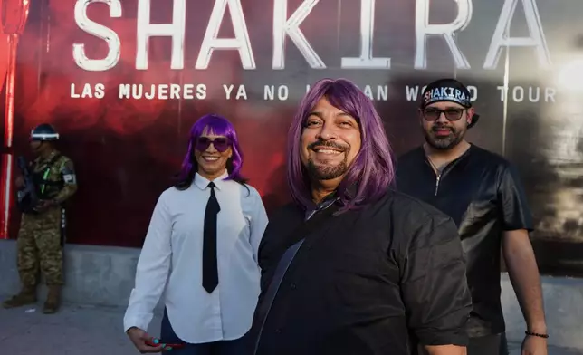 Honduran fans of Colombian pop star Shakira pose for a photo before her concert at the National Stadium in San Salvador, El Salvador, Thursday, Feb. 12, 2026. (AP Photo/Salvador Melendez)