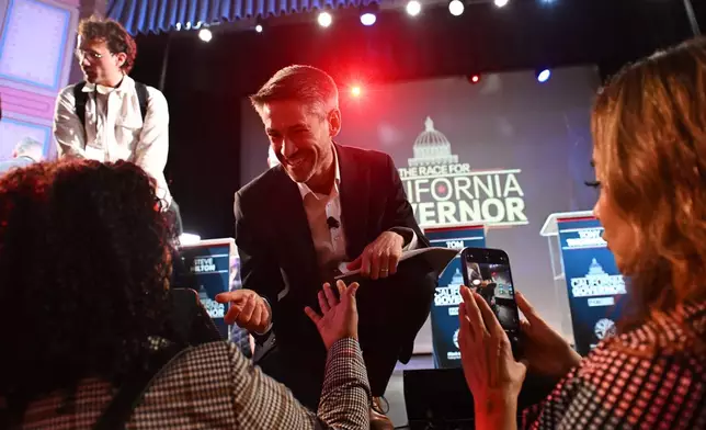 Matt Mahan talks to attendees after the California gubernatorial candidate debate Tuesday, Feb. 3, 2026, in San Francisco. (AP Photo/Laure Andrillon)