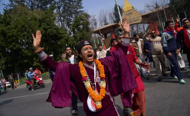 Supporters gather to welcome Nepal's former King Gyanendra Shah upon his arrival at Tribhuvan International Airport in Kathmandu, Nepal, Friday, Feb. 13, 2026. (AP Photo/Niranjan Shrestha)