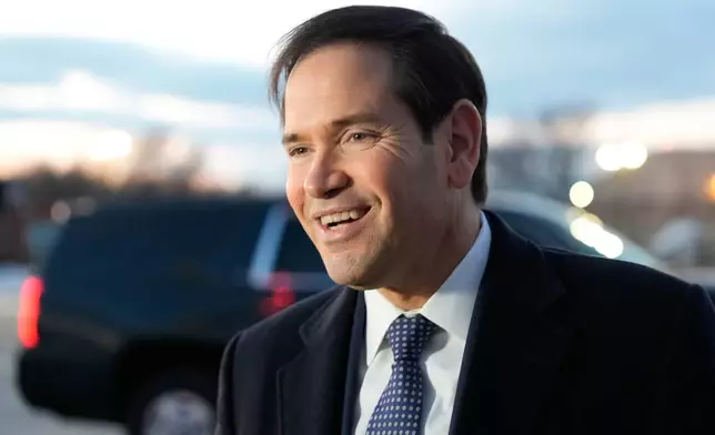 Secretary of State Marco Rubio speaks to reporters before boarding his plane, Thursday, Feb. 12, 2026, at Joint Base Andrews, Md., en route to the Munich Security Conference. (AP Photo/Alex Brandon, Pool)