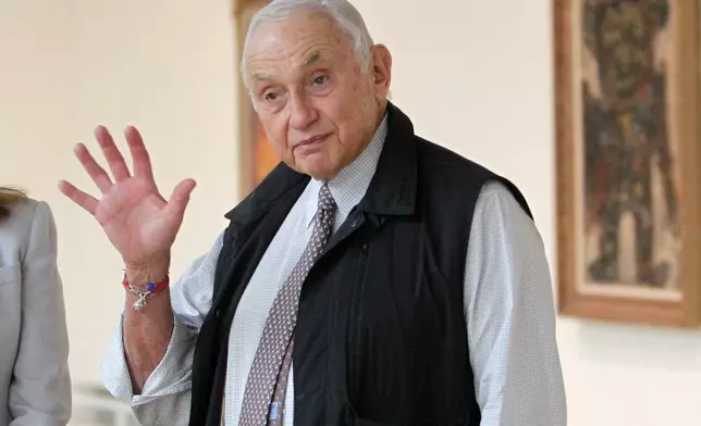FILE - Then-Chairman and CEO of L Brands Les Wexner tours the exhibit at the Wexner Center for the Arts in Columbus, Ohio, Sept. 19, 2014. (AP Photo/Jay LaPrete, File)