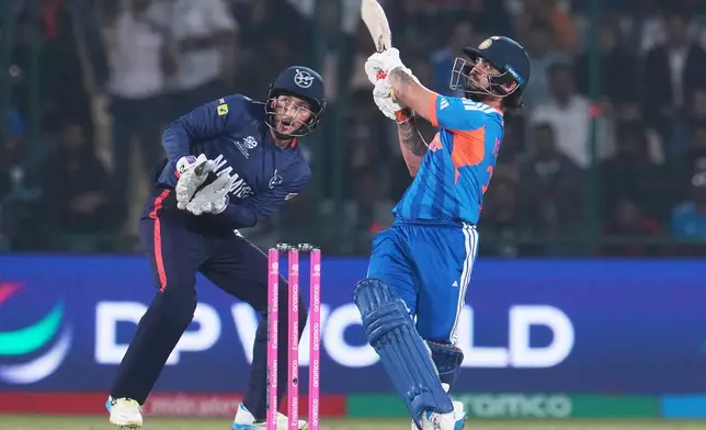 India's Ishan Kishan plays a shot during the T20 World Cup cricket match between India and Namibia in New Delhi, India, Thursday, Feb. 12, 2026. (AP Photo/Manish Swarup)