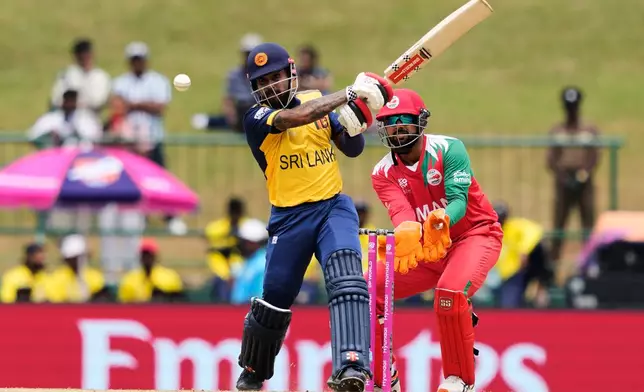 Sri Lanka's Kusal Mendis plays a shot during the T20 World Cup cricket match between Oman and Sri Lanka in Pallekele, Sri Lanka, Thursday, Feb. 12, 2026. (AP Photo/Eranga Jayawardena)