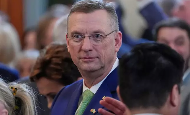 FILE - Veterans Affairs Secretary Doug Collins arrives before Ireland's Prime Minister Michael Martin and President Donald Trump speak during an event in the East Room of the White House in Washington, March 12, 2025. (AP Photo/Alex Brandon, file)