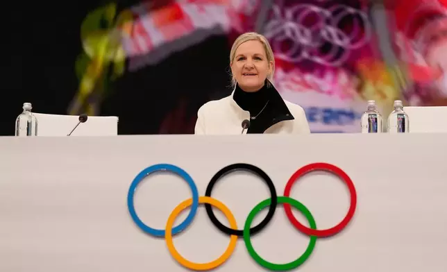IOC President Kirsty Coventry attends the opening of the IOC Session, ahead of the 2026 Winter Olympics, in Milan, Italy, Tuesday, Feb. 3, 2026. (AP Photo/Luca Bruno)