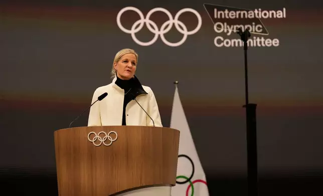IOC President Kirsty Coventry speaks, during the opening of the IOC Session, ahead of the 2026 Winter Olympics, in Milan, Italy, Tuesday, Feb. 3, 2026. (AP Photo/Luca Bruno)