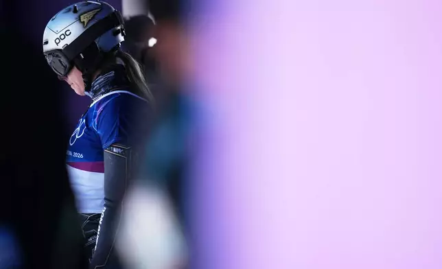 Czechia's Ester Ledecka waits to compete during the women's snowboarding parallel giant slalom finals at the 2026 Winter Olympics, in Livigno, Italy, Sunday, Feb. 8, 2026. (AP Photo/Gregory Bull)