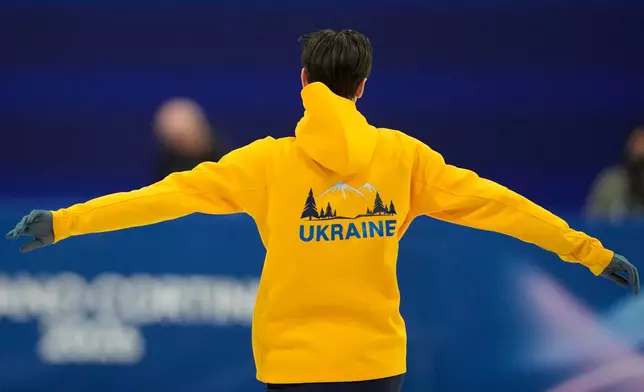 Kyrylo Marsak of Ukraine prepares to skate before the men's figure skating short program at the 2026 Winter Olympics, in Milan, Italy, Tuesday, Feb. 10, 2026. (AP Photo/Ashley Landis)