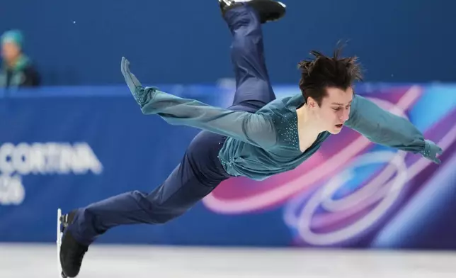 Kyrylo Marsak of Ukraine competes during the men's figure skating short program at the 2026 Winter Olympics, in Milan, Italy, Tuesday, Feb. 10, 2026. (AP Photo/Francisco Seco)