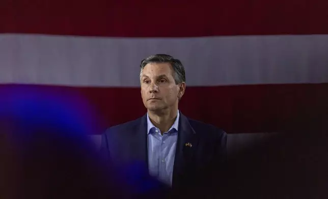 Derek Dooley, a Republican candidate for Senate in Georgia, listens to questions during an Atlanta Young Republicans campaign event Thursday, Feb. 12, 2026, in Atlanta. (AP Photo/Alyssa Pointer)