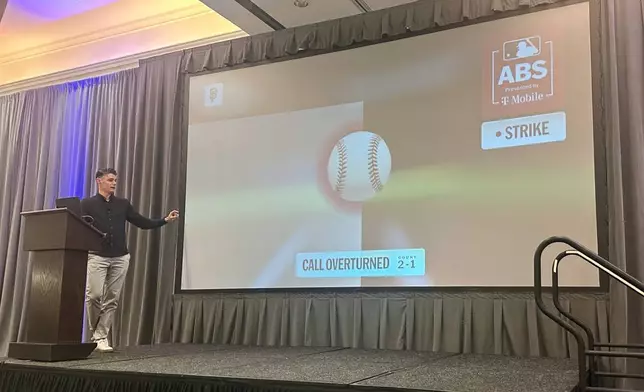MLB Vice President of On-Field Strategy Joe Martinez gives a presentation about the new Automated Ball/Strike system that will be used in regular season games, Thursday, Feb. 12, 2026, in Scottsdale, Ariz. (AP Photo/David Brandt)