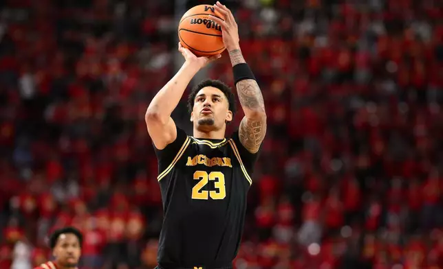 FILE - Michigan forward Yaxel Lendeborg (23) in action during the first half of an NCAA college basketball game against Maryland, Saturday, Dec. 13, 2025, in College Park, Md. (AP Photo/Nick Wass, File)