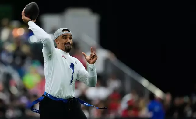 NFC quarterback Jalen Hurts (1), of the Philadelphia Eagles, passes the ball against the AFC during the first half of the NFL Pro Bowl football game, Tuesday, Feb. 3, 2026, in San Francisco. (AP Photo/Godofredo A. Vásquez)