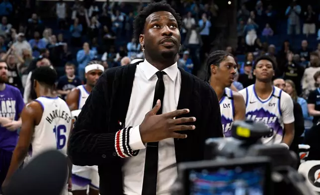 Utah Jazz forward Jaren Jackson Jr. looks on during a video tribute from his former team, the Memphis Grizzlies, in the first half of an NBA basketball game between the teams Friday, Feb. 20, 2026, in Memphis, Tenn. (AP Photo/Brandon Dill)