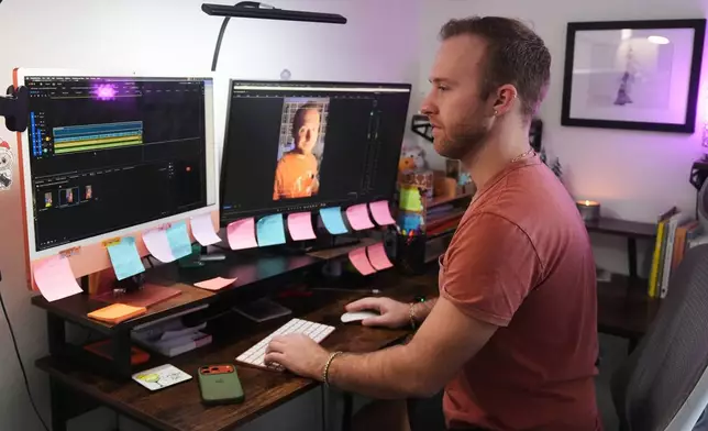 Niklaus Miller sits at his computer as he learns Bad Bunny's songs in preparation for Bad Bunny's Super Bowl halftime show at his home in the Hollywood section of Los Angeles Friday, Jan. 16, 2026. (AP Photo/Damain Dovarganes)
