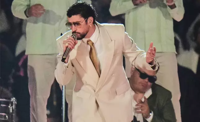 FILE - Puerto Rico artist Bad Bunny performs during his "DeBÍ TiRAR MáS FOToS" tour in Mexico City on Dec. 10, 2025. (AP Photo/Eduardo Verdugo)