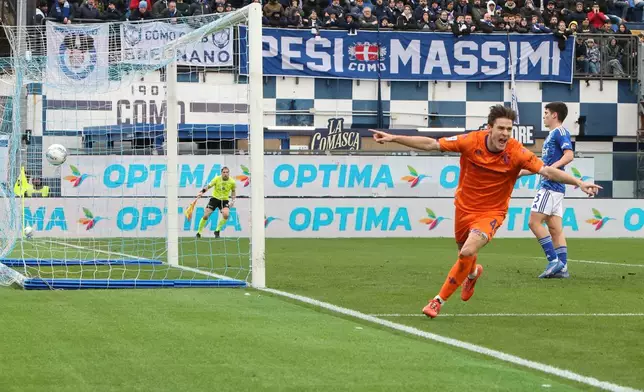 Fiorentina's Nicolo Fagioli celebrates after scoring during the Serie A soccer match between Como and Fiorentina, in Como, Italy, Saturday Feb. 14, 2026. (Antonio Saia/LaPresse via AP)