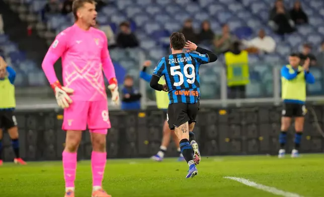 Atalanta's Nicola Zalewski celebrates after scoring his side's second goal during the Serie A soccer match between Lazio and Atalanta in Rome, Saturday, Feb. 14, 2026. (AP Photo/Gregorio Borgia)