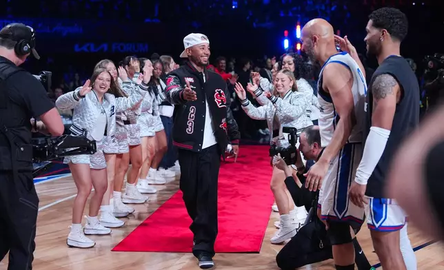 Los Angeles Dodgers' Mookie Betts is introduced before an NBA basketball's All-Star Celebrity Game Friday, Feb. 13, 2026, in Inglewood, Calif. (AP Photo/Jae C. Hong)