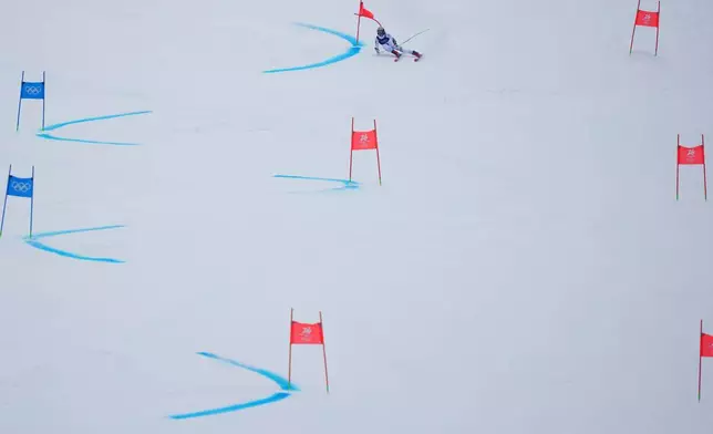 Brazil's Lucas Pinheiro Braathen competes during an alpine ski, men's giant slalom race, at the 2026 Winter Olympics, in Bormio, Italy, Saturday, Feb. 14, 2026. (AP Photo/Julia Demaree Nikhinson)