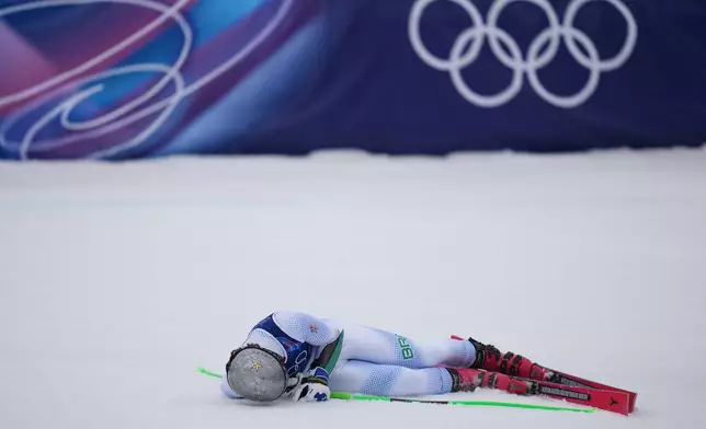 Brazil's Lucas Pinheiro Braathen celebrates at the finish area of an alpine ski, men's giant slalom race, at the 2026 Winter Olympics, in Bormio, Italy, Saturday, Feb. 14, 2026. (AP Photo/Julia Demaree Nikhinson)