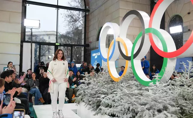 Mara Navarria of Italy presents an outfit during a fashion show ahead of the 2026 Winter Olympics, in Milan, Italy, Wednesday, Feb. 4, 2026. (Xue Yuge/Pool Photo via AP)