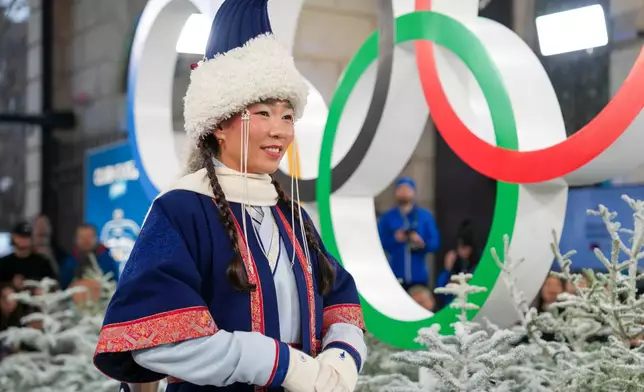 Ariuntungalag Enkhbayar of Mongolia presents an outfit during a fashion show ahead of the 2026 Winter Olympics, in Milan, Italy, Wednesday, Feb. 4, 2026. (Xue Yuge/Pool Photo via AP)
