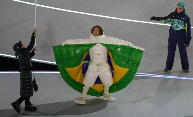 Lucas Pinheiro Braathen attends the Olympic opening ceremony at the 2026 Winter Olympics, in Milan, Italy, Friday, Feb. 6, 2026. (AP Photo/Stephanie Scarbrough)