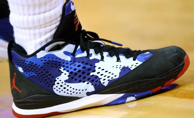 FILE - Los Angeles Clippers guard Chris Paul's shoes are seen during the second half of an NBA basketball game in New Orleans, Wednesday, March 26, 2014. (AP Photo/Jonathan Bachman, File)