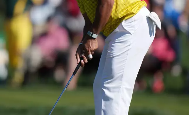 Hideki Matsuyama, of Japan, watches his par-saving putt at the second hole during the final round of the Phoenix Open golf tournament Sunday, Feb. 8, 2026, in Scottsdale, Ariz. (AP Photo/Ross D. Franklin)