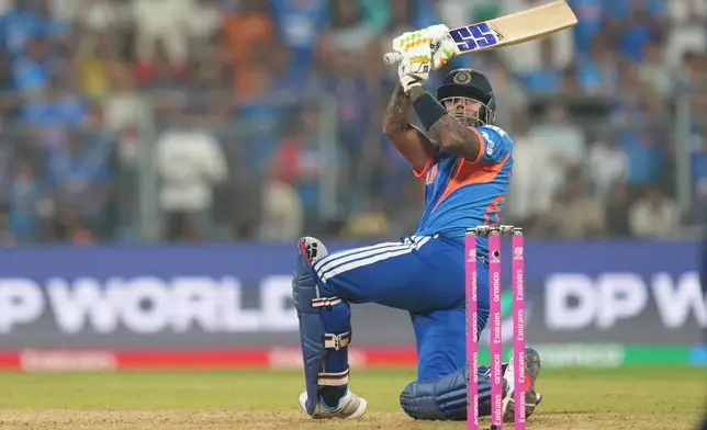 India's captain Suryakumar Yadav plays a shot during the T20 World Cup cricket match between India and the United States in Mumbai, India, Saturday, Feb. 7, 2026. (AP Photo/Rafiq Maqbool)