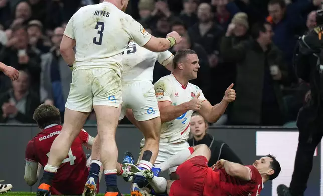 England's Ben Earl celebrates scoring a try during the Six Nations rugby union match between England and Wales in London, Saturday, Feb. 7, 2026. (AP Photo/Alastair Grant)
