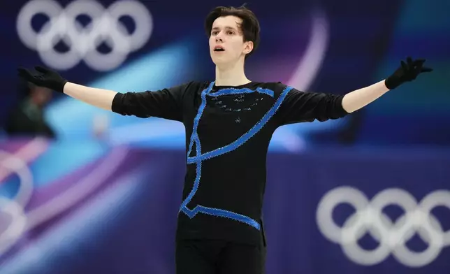 Kyrylo Marsak of Ukraine competes during the men's free skate program in figure skating at the 2026 Winter Olympics, in Milan, Italy, Friday, Feb. 13, 2026. (AP Photo/Natacha Pisarenko)